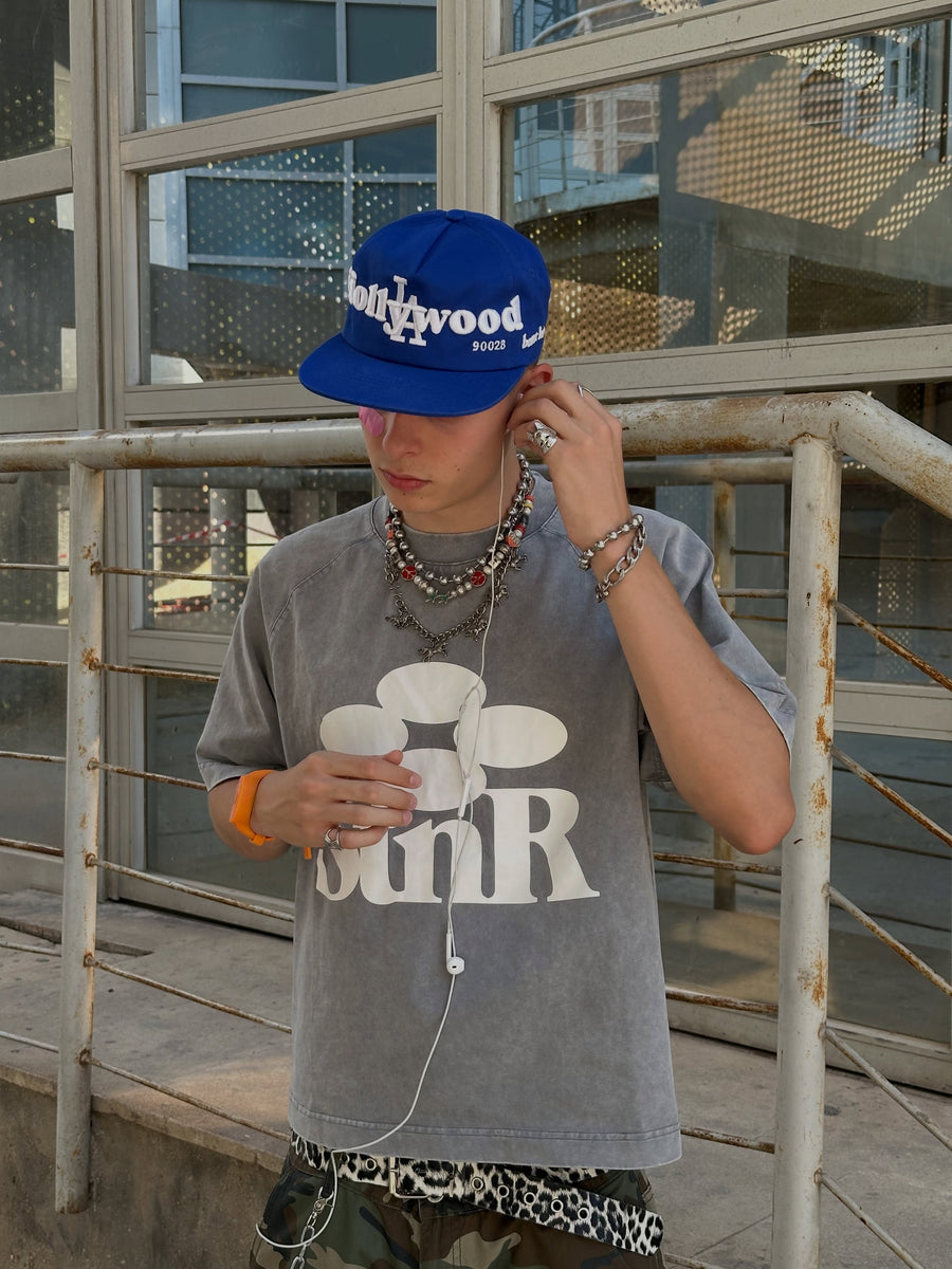 Person wearing the hat