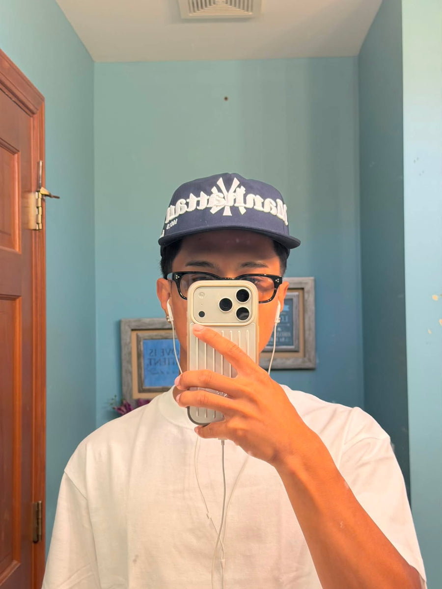 Person wearing the hat