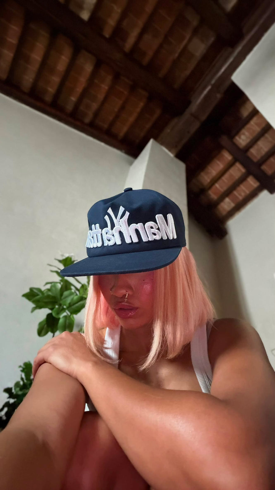 Person wearing the hat